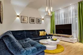 The clean white walls allow the curtains to shine as a feature in the room, and the matte velvet material of the curtains adds a touch of luxury. Top 15 Curtain Colors For White Walls In Your Home