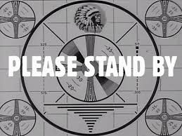 Please Stand By ...