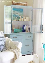 Glass Display Cabinets To Showcase Coastal Collections Decorative Accessories Coastal Decorating Living Room Beach Cottage Style Coastal Room