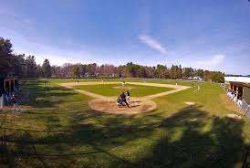 An aerial view over the center area of four connected baseball fields. Pickard Baseball Diamond Bowdoin College