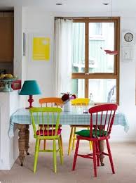 As these 15 colorful dining areas show, using colorful chairs (and a few colorful tables) is an easy way to punch up the fun in your home. Multi Colored Dining Chairs A Playful Touch For The Decor Mixed Dining Chairs Colored Dining Chairs Dining Room Design
