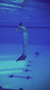 A Mako Merman Training In A Pool Mako Mermaids Realistic Mermaid Silicone Mermaid Tails