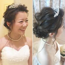 ティアラを着けたブライダルヘアの前髪アレンジ marry マリー wedding dresses lace dresses wedding dresses