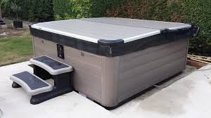 Here's an excellent video outlining how to make your own cover lifter for your spa cover. Different Ways To Cover Your Hot Tub