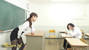 Japanese teacher touches herself while her student is stu...