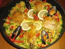 Paella Mit Hahnchen Und Meeresfruchten Rezept Mit Video Rezept Paella Rezept Paella Meeresfruchte