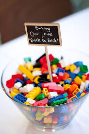 27 Impossibly Fun Ways To Entertain Kids At Your Wedding Wedding With Kids Kids Table Wedding Lego Wedding