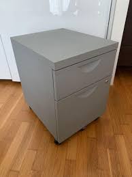 What material options are available in file cabinets? Ikea Erik Files Cabinet Furniture Home Living Furniture Shelves Cabinets Racks On Carousell