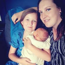 Help finding 90s book with unique haircut and time travel