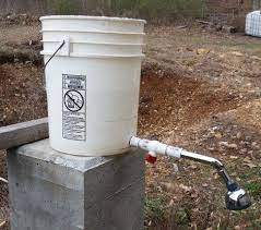 Showering When You Don T Have Plumbing Off Grid Shower Grid Shower Off Grid Shower Small Tiled Shower Stall