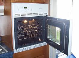 The side swing door helps make it easier to insert and remove heavy pans from the oven. Kitchens Specialistic Construction