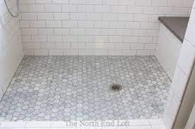 We're constantly on the lookout not just for beautiful and interesting new tiles, but also for inspiring examples for how to use those tiles to create unforgettable stunning spaces. The North End Loft Master Bathroom Reveal Shower Floor Tile Shower Floor Tile Bathroom