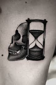 More meaningful tattoo ideas at design press, explore now! Black Dotwork Skull With Hourglass Tattoo On Side Tattooimages Biz