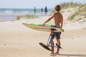 A long, narrow board made of wood or plastic, used for riding on waves as a thick surfboard floats well. Slingshot Sky Walker Foil Surfboard Boards Skatepro
