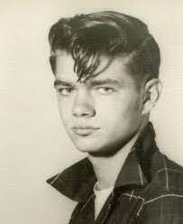 1957 Young Greaser Biker Hair Side Swept Into Elephant Trunk Hairstyle Using Petrolatum Pomade In 2021 Greaser Hair Side Swept Hairstyles Slicked Back Hair