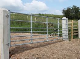 This gate was custom made using a heavy gage steel pipe that is commonly used for galvanized chain link fencing. Field Gates Iae Fencing