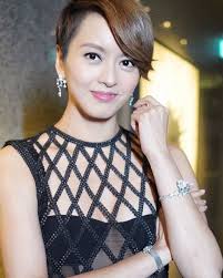 梁詠琪Gigi Leung Wing Kei added a...