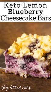My Keto Lemon Blueberry Cheesecake In A Handheld Bar Topped With Crumb Topping T In 2020 Blueberry Cheesecake Bars Low Carb Recipes Dessert Lemon Blueberry Cheesecake