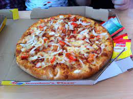 seafood pizza with crab surimi shrimp octopus chilly and onion at domino s pizza seafood pizza dominos pizza food