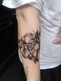 Their sound is hard rock mixed with blues rock influences. Yorkshire Rose Tattoo