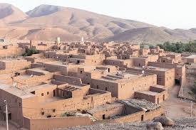 Typical Moroccan Village With Mud Houses And Palm Trees In Draa Valley Morocco Remains Of A Typical Old Kasbah Fortress In Draa Valley Morocco Destinationer