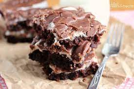 Homemade chocolate brownies topped with gooey marshmallows and creamy chocolate frosting. Fudgy Marshmallow Brownies Video Julie S Eats Treats