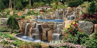 In addition to the surrounding landscape, a pond opens up the opportunity to explore plants that are suitable for a. Stone Waterfalls And Vanishing Edge Pool Landscaping Network