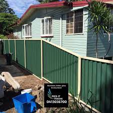 image may contain plant and outdoor cottage outdoor fence