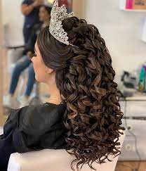 Letting your hair down showcases your silky, soft locks. 21 Best Quinceanera Hairstyles For Your Big Day Beauty Quince Hairstyles Quinceanera Hairstyles Hair Styles