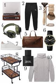 You can't go wrong with a personalized coffee mug or a tie featuring his kids names or photos. Holiday Gift Ideas For Him Gift Guide Scout The City