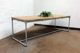 When you can't find one, make one! Carly Reclaimed Scaffolding Board Dining Table With Galvanized Pipe Legs Bespoke Furniture Vinterior