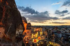 Cappadocia's landscape includes dramatic expanses. Hd Wallpaper Capadocia Cave Caves City Cityscape Europe Goreme Hotel Wallpaper Flare
