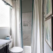 Plus excess water in a bathroom can create issues with mold and mildew.luckily, there are a few different things you can try if you're wondering how to keep water from leaking outside a shower curtain. Drop In Tub With 2 Shower Curtains Design Ideas