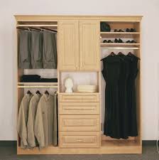 Storage cabinet includes one adjustable shelf to accommodate items of various sizes Modern Dress Cabinet Design Ecsac
