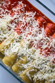 Red And Green Chicken Enchiladas The Filling Is Chicken Cheese Seasonings And Salsa Nothing Too Fanc Enchilada Recipes Mexican Food Recipes Mexican Dinner