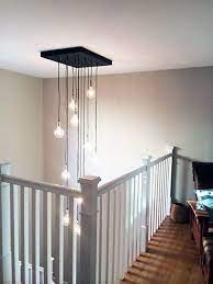 5 Easy Ways To Brighten Up A Dark Apartment Stairway Lighting Stair Lighting Pendant Stairway Lighting Ideas