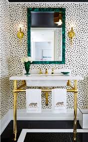 Despite a powder room's petite size, a bold wall design, like the thick stripes seen here, is a smart way to give the small space presence. Bathroom Wallpaper Classics Atticmag