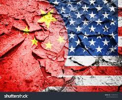 trade war concept usa flag against china flag on dry cracked earth backgroundusa flag concept trade think tank concept china flag