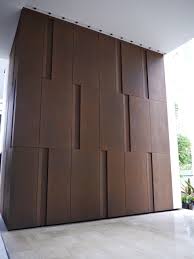 Corten Steel Designs And Engineering 3 Ardmore Park Corten Design Facade With Backlight At Night Wall Panel Design Interior Wall Design Lobby Interior Design
