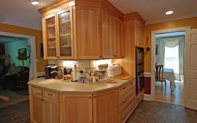 Because rebuild means changing the structure and it will involve the work labour. Cabinet Refacing