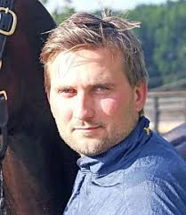 Melander is 'humbled' after being named Trainer of the Year