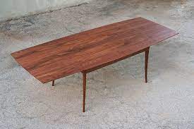 Choice of glass or wood slides. Dutch Pullout Dining Table Offerman Woodshop