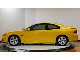Image result for Yellow 2004 Pontiac