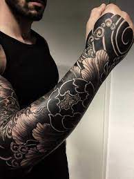 Sakura branch with flower buds. 25 Symbolic Japanese Tattoo Ideas 2021 The Trend Spotter