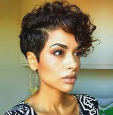 The sides of the hair are cut shorter while leaving a band of longer hair also i got very curly hair but she used a hair straightener. Faux Hawk Hair Styles Thick Hair Styles Short Hair Styles