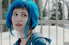 Her hair is dyed blue, as clearly seen by the cover art of that book. Gays In Space Blomskvist Ramona Flowers Blue Hair