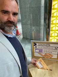 Remember to take your voting envelope out of your bag and drop it into a…