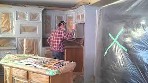 To plastic off the insides of your cabinet boxes, use a 3m hand masker dispenser. How To Prep And Spray Kitchen Cabinets Youtube