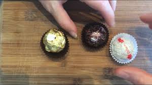 feʁɛʁɔ ʁɔʃe) is a chocolate and hazelnut confectionery produced by the italian chocolatier ferrero. Ferrero Rocher Raffaello And Rondnoir Battle Youtube