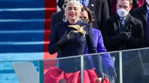 This year, there were no crowds flocking the washington mall, due to the deadly course of the pandemic and safety concerns after a violent insurrection at the us capitol in. Michelle Obama Dior Air Jordan 1 Sneakers And Lady Gaga S Pin A Look At Inauguration Day Fashion Nbc Chicago